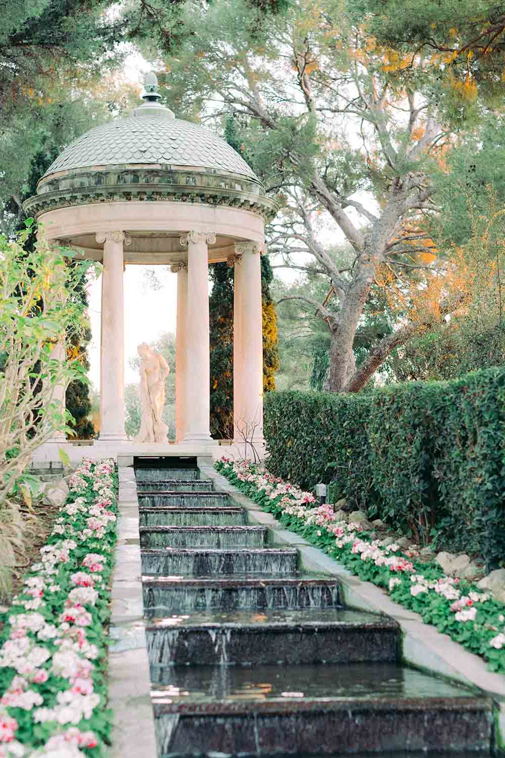 Temple of Love and stepped waterfall in the French garden at Villa Ephrussi de Rothschild